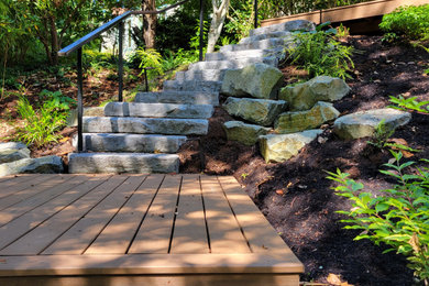 Design ideas for a large rustic partial sun hillside walkway in Portland with decking for summer.
