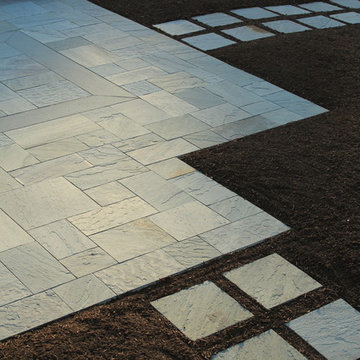 Bluestone Terraces, Porches, walkway and Plantings By Garden Artisans LLC