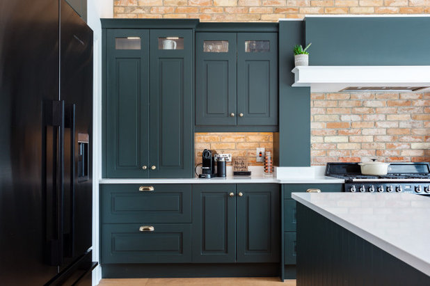 Dark Green Cabinets Add Elegance to a Welcoming Kitchen