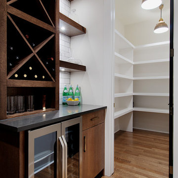 Butlers pantry with large walk-in pantry