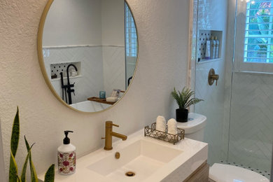 Example of a trendy bathroom design in Miami with a floating vanity