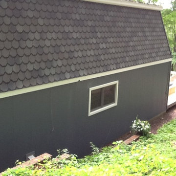 Mansard roof with copper trim and new siding