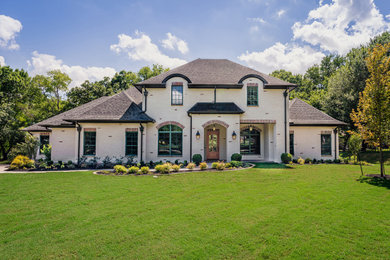 Inspiration for a french country exterior home remodel in Dallas