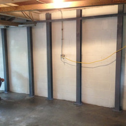 Steel buttresses to stabilize basement - garage wall - Products