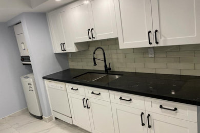 Example of a minimalist laundry room design in Toronto