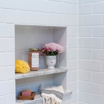 Classic and Fresh Bathroom with an exciting Navy Tile Wall