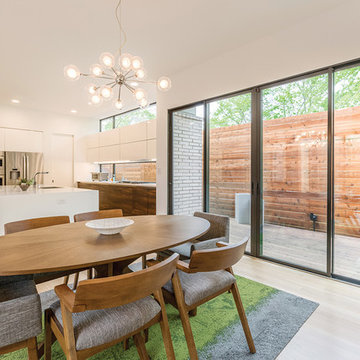 Sliding glass door by kitchen provides sunlight