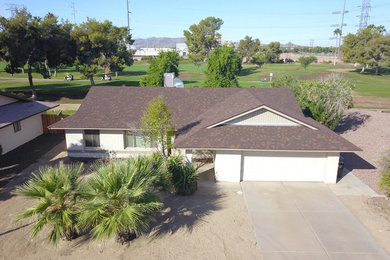 Mid-sized elegant white one-story exterior home photo in Phoenix with a shingle roof
