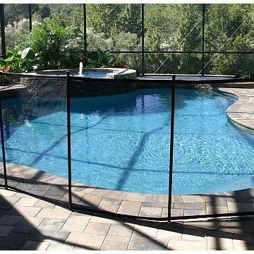 150 - Gated freeform pool with water feature in jacuzzi