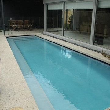 DS Grinding Services: Honed Concrete with infinity pool surround