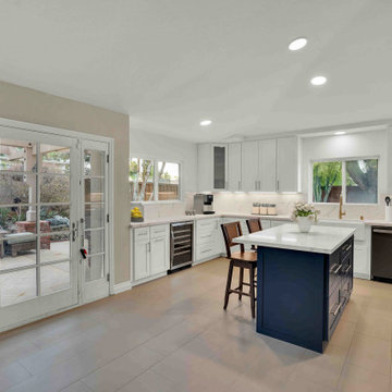 Laguna Niguel Bright Kitchen Remodel with Quartz Counters & Navy Blue Island