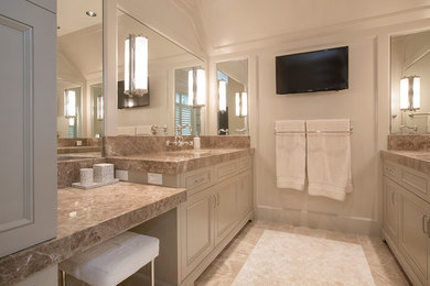 Design ideas for a large traditional master bathroom in Omaha with an undermount sink, furniture-like cabinets, grey cabinets, a freestanding tub, an alcove shower, a two-piece toilet, beige tile, stone tile, grey walls and marble floors.