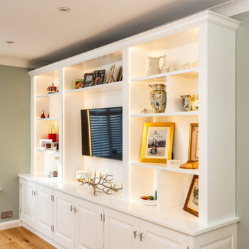 Media wall with raised and fielded panel doors