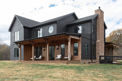 Example of a cottage exterior home design in Nashville