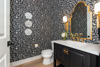 Design ideas for a transitional powder room in Edmonton.