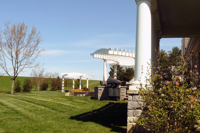 Design ideas for a large partial sun backyard landscaping in Baltimore.