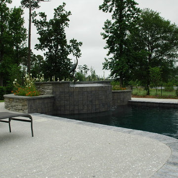 tranquil pool with a waterfall