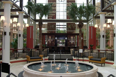 Example of a transitional home design design in Orlando