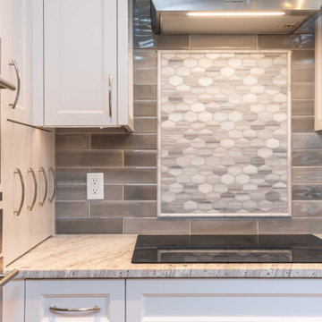 Modern Gray and White Kitchen with Peninsula Seating for 4