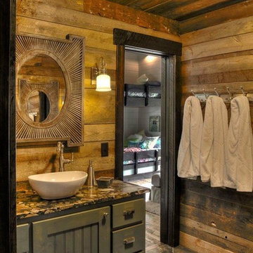 Weathered Antique Paneling in a Rustic Lodge Bathroom with Bunk Room View