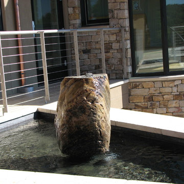 Infinity Edge Pool with Spa and Water Feature