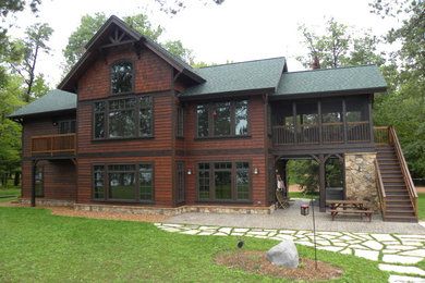 Rustic exterior home idea in Other