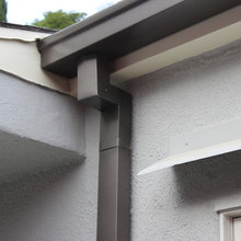 Rain gutters and down spouts