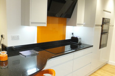 Photo of a medium sized modern kitchen in Cheshire.