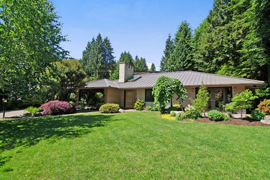 Transitional exterior home idea in Vancouver