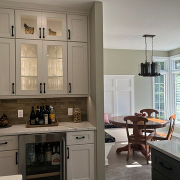Transitional Candlelight Cabinet Kitchen with Custom Color Island