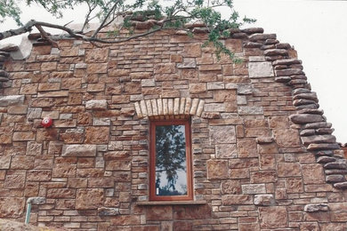 Rustic stone house exterior idea in Phoenix