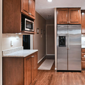 Traditional Chestnut Cherry Kitchen in Reston, VA