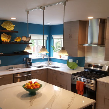 This is a two tone updated kitchen with efficient use of space & feature points