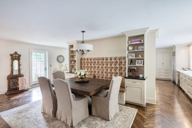 Example of a large classic medium tone wood floor and brown floor dining room design in New York