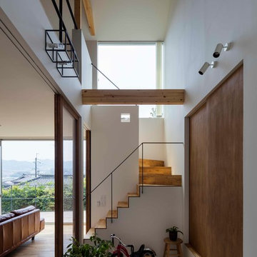 生駒の家 吹き抜けを通じて家族がつながる暖かい家 House in Ikoma