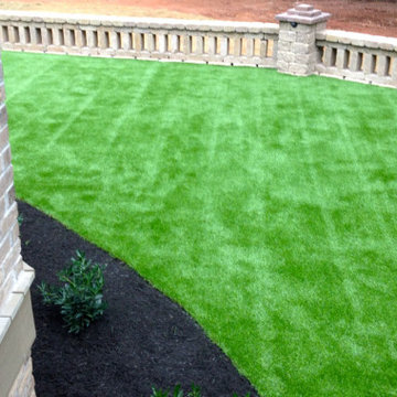 Synthetic Grass and Grotto Hardscapes
