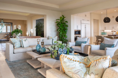 Tropical open concept family room in Orange County.