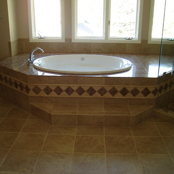 Air Massage Tub within Ceramic, Stone, and Granite Tub Deck.