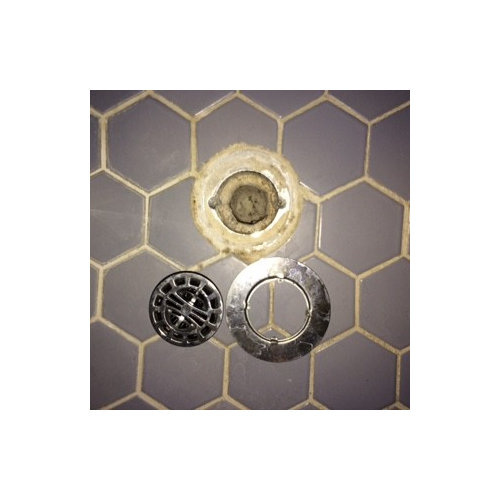 Help! Fix leaky shower drain from top