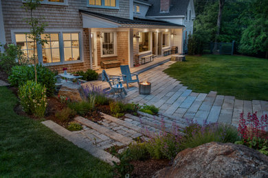 Example of a cottage patio design in Boston