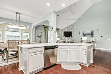 Beach style home design photo in Other