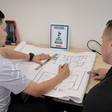 Cal prestige Construction going over project Plans