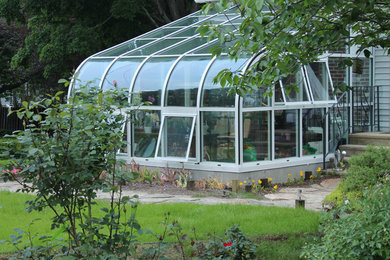 Curved Eave Solarium / Greenhouse