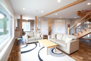 Example of a mid-sized classic formal and open concept dark wood floor living room design in Vancouver with gray walls, a standard fireplace, a tile fireplace and no tv