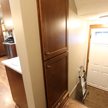 Transitional Cherry Kitchen with Great Organizational Storage and Coat Rack