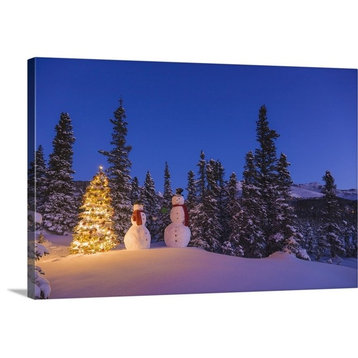 "Two snowmen exchanging gifts standing next to a Christmas tree" Wrapped Canv