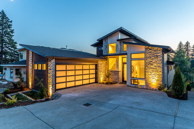 Inspiration for a large contemporary white three-story concrete fiberboard house exterior remodel in Portland with a hip roof and a shingle roof