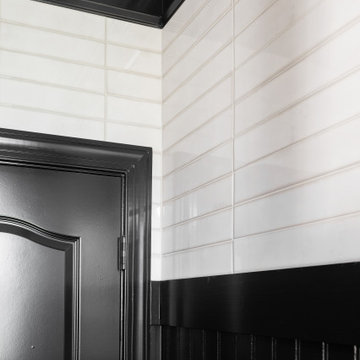 Modern Luxury Master Bathroom with Black Solid Surface Tub