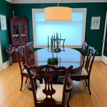 Long Oval Mahogany Dining Table with Chippendale Chairs