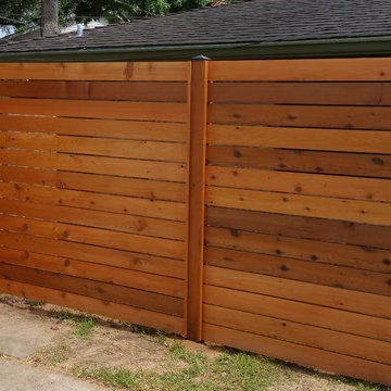 Custom Horizontal cedar fence with automatic swing gate